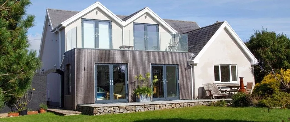 An image of a house with a glass door.